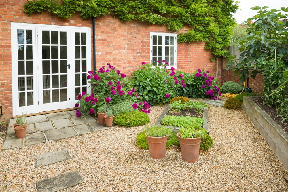 Uk,House,And,Garden,With,Patio,And,French,Doors.,Cottage